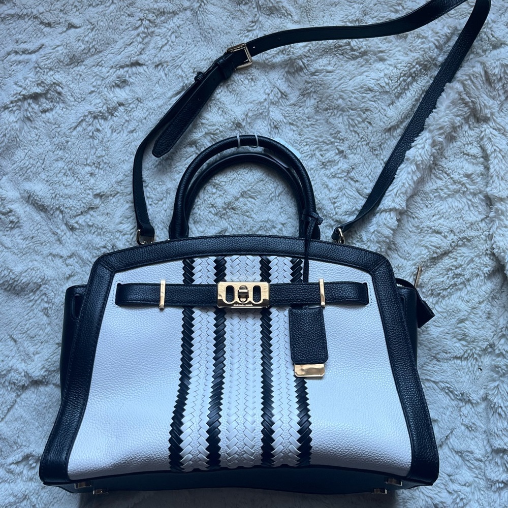 Stylish Black and White Satchel with Adjustable Strap
